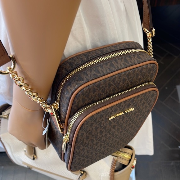 MICHAEL KORS 
Jet Set Travel Medium Logo Crossbody Flight Bag
# 35F1GTVC2B
Brown - Picture 2 of 16